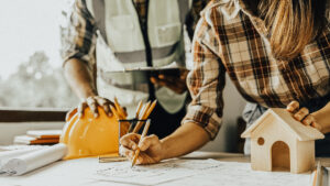 Builders looking at custom home plans